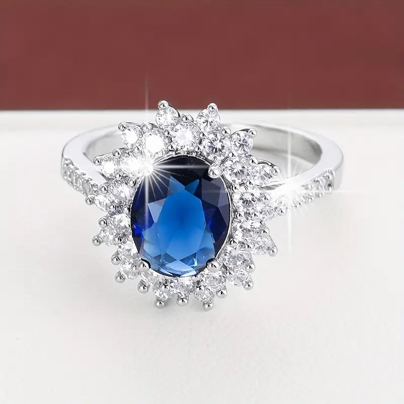 Oval Blue Crystal Double Halo Ring | Amelia Bellrose Jewellery