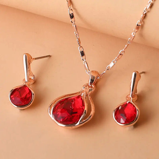 Red Crystal Drop Jewellery Set Rose Gold | Amelia Bellrose Jewellery